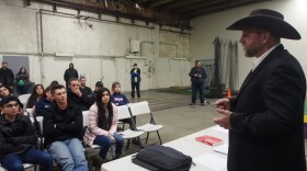 Ammon Bundy speaks to a crowd of supporters in 2020 during the COVID-19 lockdown.