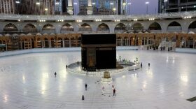 A few worshippers perform al-Fajr prayer at the Kaaba, Islam's holiest shrine, at the Grand Mosque complex in Saudi Arabia's holy city of Mecca. Saudi Arabia has announced it will hold a "very limited" hajj this year, with only pilgrims already in the kingdom allowed to perform the annual ritual. 