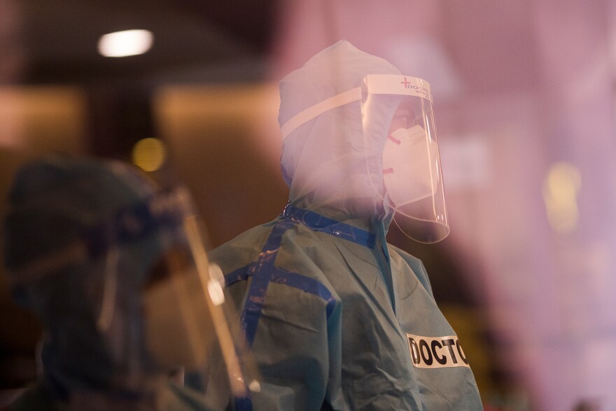 A doctor at a quarantine center for COVID-19 patients in April, when a New Delhi banquet hall was converted into an isolation center to handle rising cases of infection.