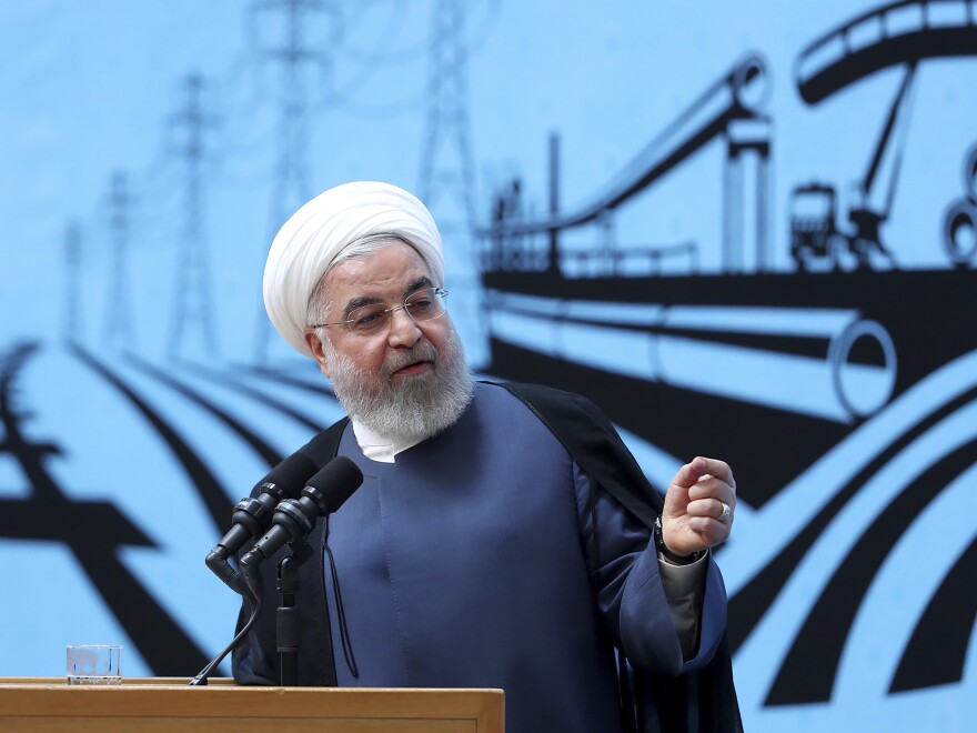 In a photo released by the official website of the office of the Iranian presidency, President Hassan Rouhani speaks at a conference in Tehran on Monday.