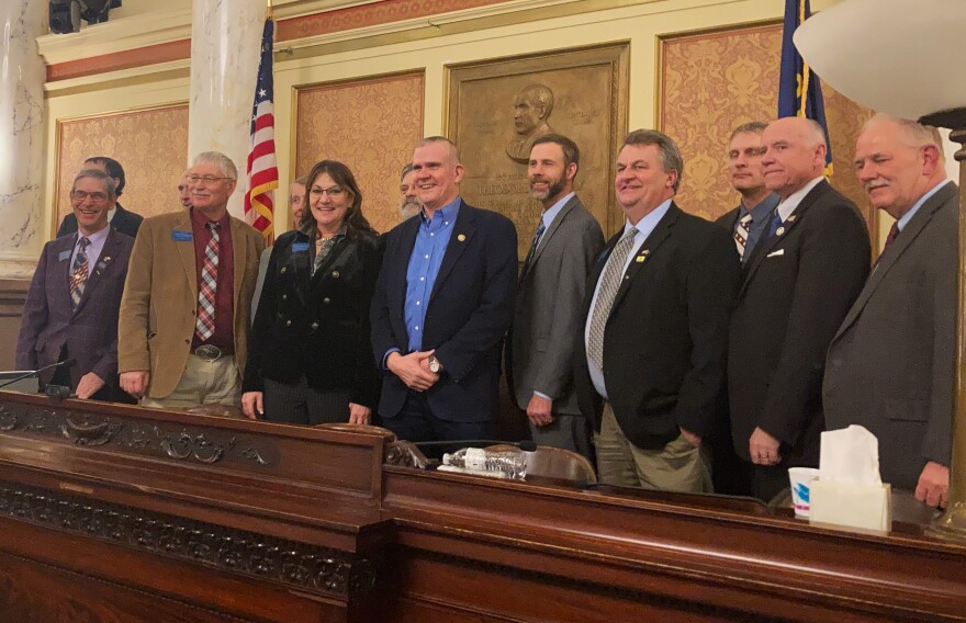 Members of the Montana Freedom Caucus pose with Congressman Matt Rosendale in the Old Supreme Court Chambers inside the state Capitol on Jan. 20, 2023.