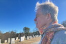Terry McKiernan, president of BishopAccountability.org, visits a cemetery in Douglas where Phil Saviano is buried. Saviano was a board member of BishopAccountability.org and a