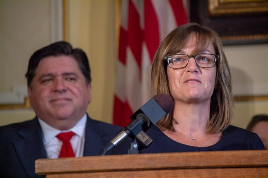 Rep. Katie Stuart, D-Edwardsville, is pictured at a news conference in the governor's office in 2019. Stuart is sponsoring a bill to expand ballot drop box and curbside voting in the state.