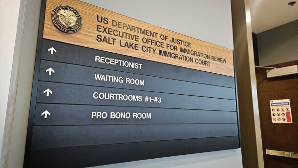 A sign at Salt Lake City Immigration Court directs visitors, March 20, 2025.
