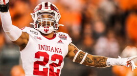 Indiana's Jamar Johnson celebrates on the field during the TaxSlayer Gator Bowl against Tennessee.