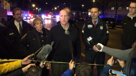 SPD assistant chief Robert Merner responds to reporter questions in the SODO neighborhood after a shooting on Tuesday night.