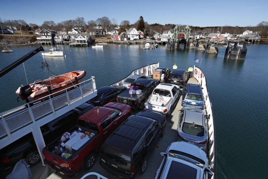 An automobile ferry arrives at North Haven, Maine, Monday, March 16, 2020.