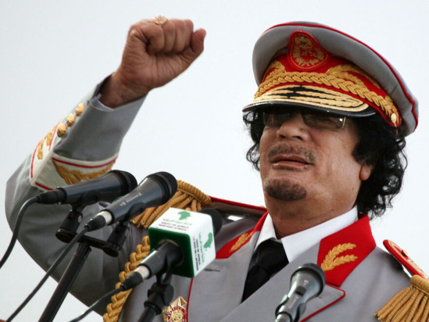 Libyan  leader Moammar Gadhafi speaks in Tripoli on June 12, 2010, during a ceremony marking the 40th anniversary of  the evacuation of the American military bases in the country.