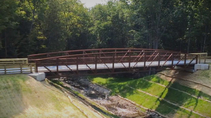 The newly built bridge above Buckhorn Creek. The bridge is part of a $2.2 million project to restore that creek’s shoreline and banks and removed a dam that separated it from the Muskegon River.