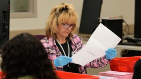 A ballot is inspected at a ballot processing center during the California primary election on Tuesday, June 2, 2026, in Sacramento, Calif.