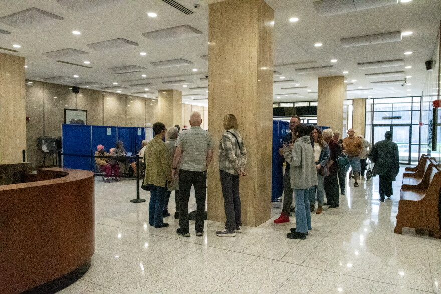 Early voting lines snaked around the lobby at the Rousseau Center on October 21, 2026.