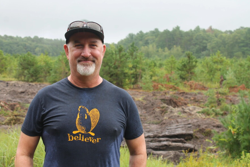 Alex Hackman, director of ecological restoration at Mass Audobon, is part of the team restoring Century Bog to wetlands.