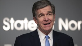 North Carolina Gov. Roy Cooper, seen here during a June 18, 2020, press briefing, said Wednesday he needs more time to decide on a plan for how public schools will operate in the fall during the coronavirus pandemic. 