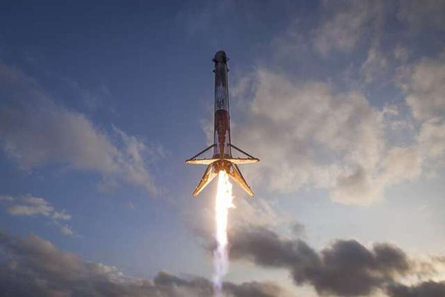 A SpaceX Falcon 9 rocket lands on a barge at sea for the second time. Photo: SpaceX