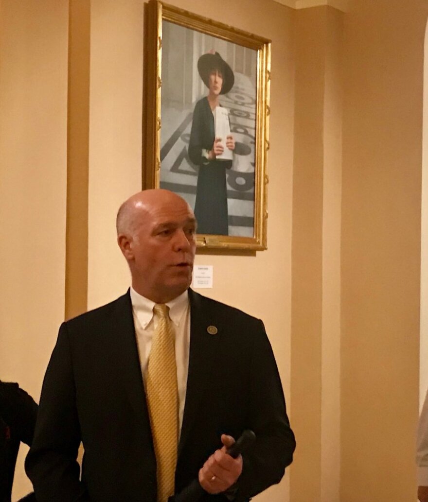 Representative Greg Gianforte in front of the Jeannette Rankin portrait in the US Captiol building during an evening tour he gave for visiting Montanans