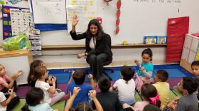 Ushma Shah, an assistant superintendent in Elgin, fills in for a kindergarten teacher.