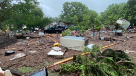 Sandy Creek flooding in Travis County on July 5, 2025, left debris strewn across a small orchard