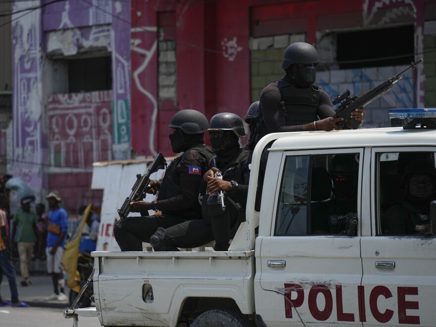 Police patrol the Champ de Mars area of Port-au-Prince, Haiti, Wednesday, April 24, 2024.