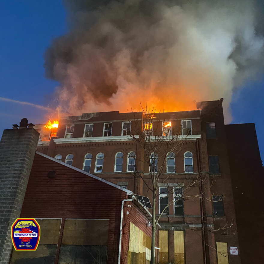 Flames are seen from the Grant Blvd. side of the campus. An SFD drone was also deployed to help incident commanders on the ground tell firefighters on the ladders where to attack the flames.