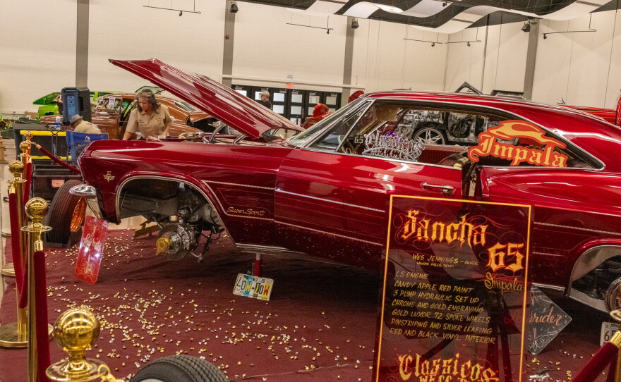 Exterior of Wes Jennings’ red and gold 1965 Chevrolet Impala, photo by Alexander Brown.