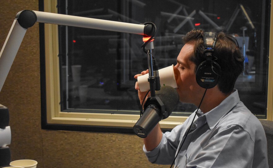 Sam Dingman tries eggnog in KJZZ's studio.