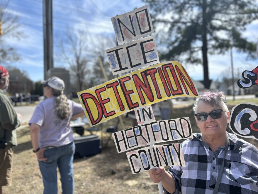 Lifelong Ahoskie resident Kim Hoggard participates in a protest on Saturday, Mar. 14, 2026 against a new immigration detention facility in Hertford County.