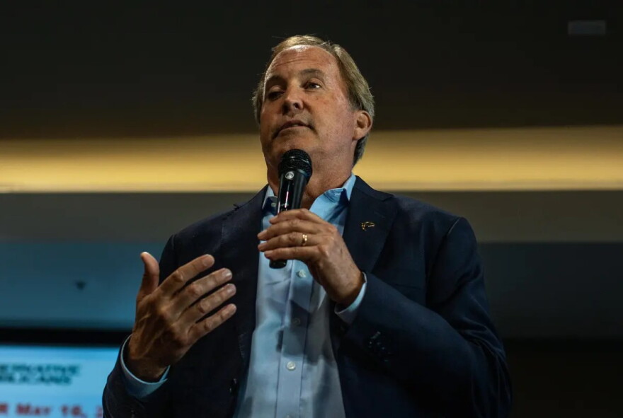  Texas Attorney General Ken Paxton attends a campaign event in Bulverde in May. A process server accused Paxton of trying to avoid being served with a subpoena in court documents Monday. 