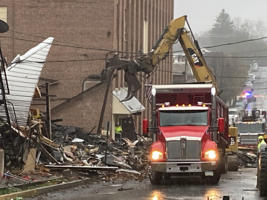 Rubble is cleared at the site of a deadly explosion at a chocolate factory in West Reading, Pa., Saturday, March 25, 2023. 