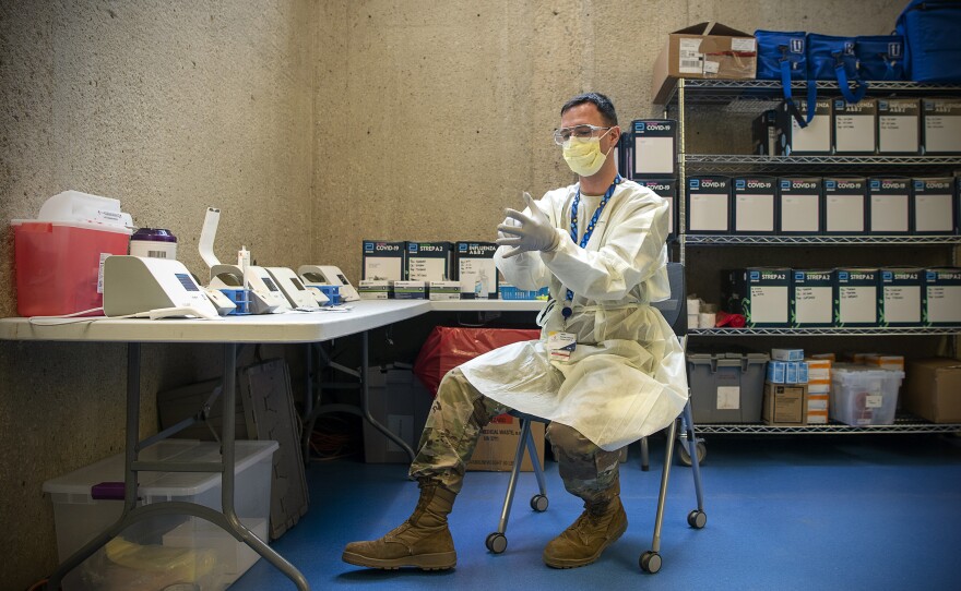 Staff Sgt. Justin Martin is helping to process COVID-19 tests and swab patients at the COVID-19 testing site at CAS.