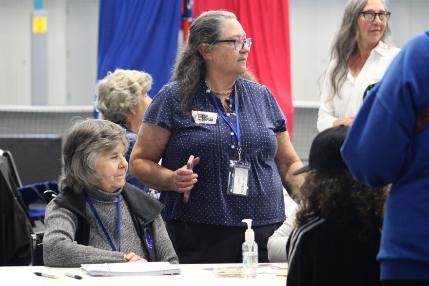 Poll workers assist Soldotna Precinct voters on Election Day on Tuesday, Aug. 18, 2026 in Soldotna, Alaska.