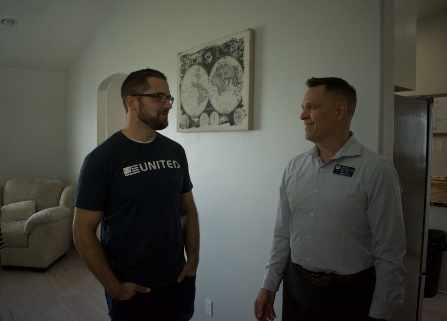 Andy Allen, director of Utah State University’s Veterans Resource Office, and Nathan Ruben, local entrepreneur and homeowner, stand inside the renovated Hyde Park house on July 15, 2025. The home will serve as dedicated housing for student veterans facing homelessness or isolation.