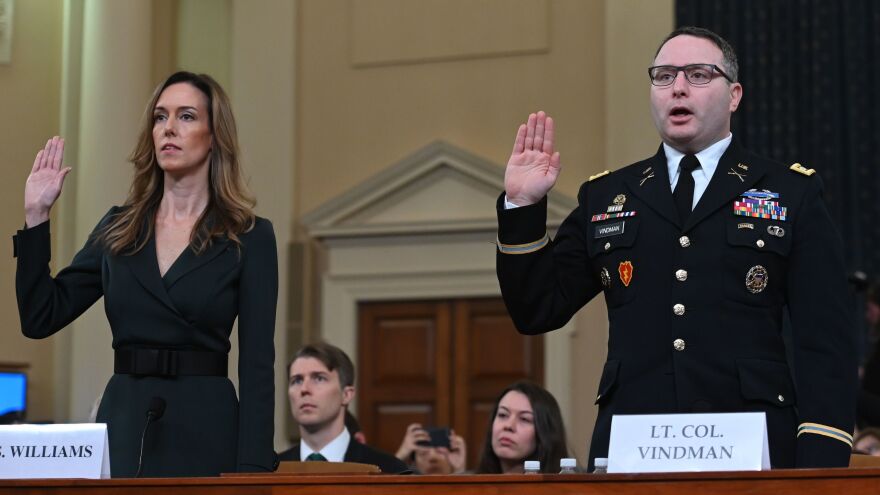 Jennifer Williams and Lt. Col. Alexander Vindman take the oath before testifying during the House Intelligence Committee hearing on Tuesday.