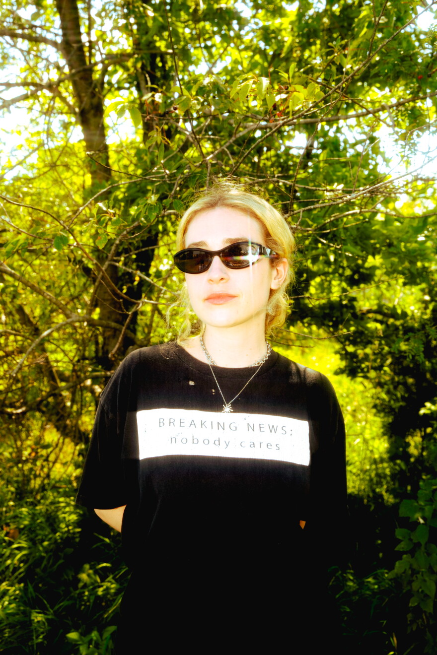 a woman posing for a photograph 