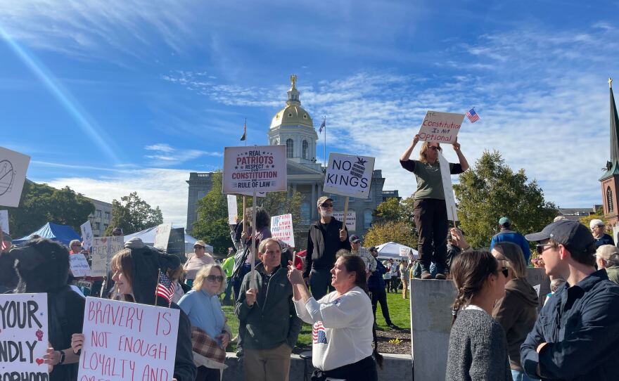 Demonstrators gather on the State House lawn in Concord for a No Kings rally in protest of the Trump administration on Oct. 18, 2025.