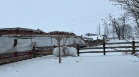 One of at least 20 poultry barns that collapsed in Rockingham County this week under the weight of ice and snow.