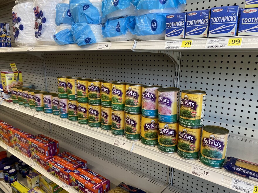 Canned food on shelfs.
