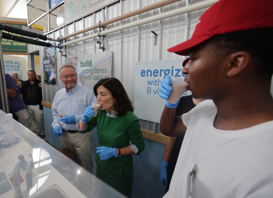 Gov. Kathy Hochul stops at the New York State Fair's famous milk bar.