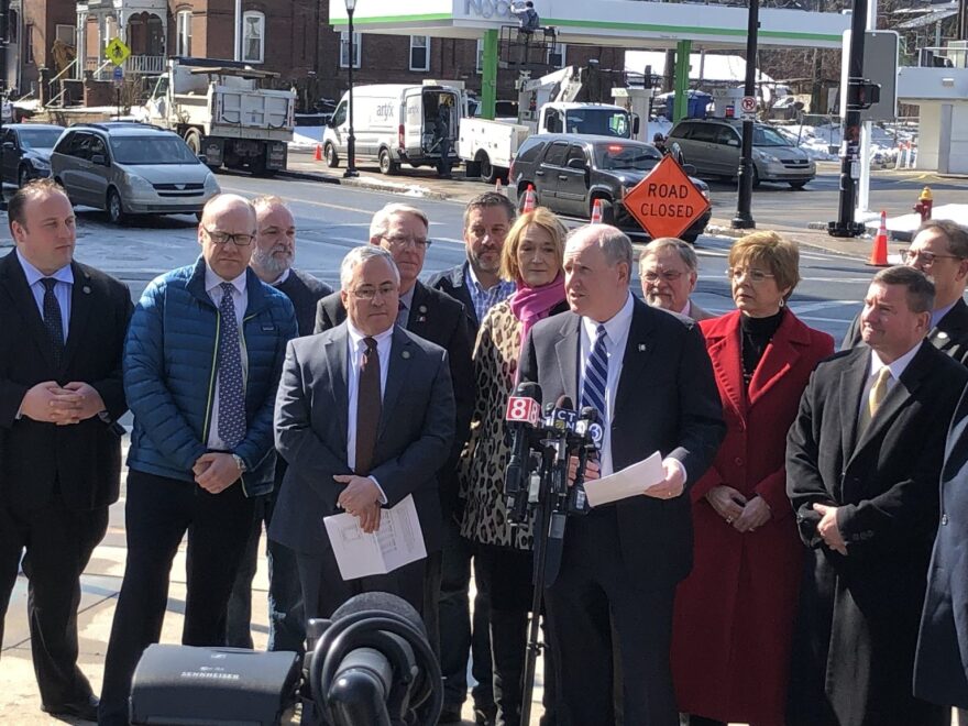 Senate Minority Leader Kevin Kelly (at microphone) and other Senate and House Republicans near a Hartford gas station on Thursday called for suspension of CT's wholesale fuel tax.