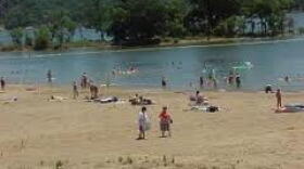 People playing in the water at Taylor's Ferry on Fort Gibson Lake