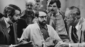 Mass murderer James Ruppert, center, listens to his attorneys, H.J. Bressler, left, and Hugh Holbrook, right, as they prepare to ask for a change of venue retrial on March 18, 1980 in Butler County Common Pleas Court in Hamilton, Ohio