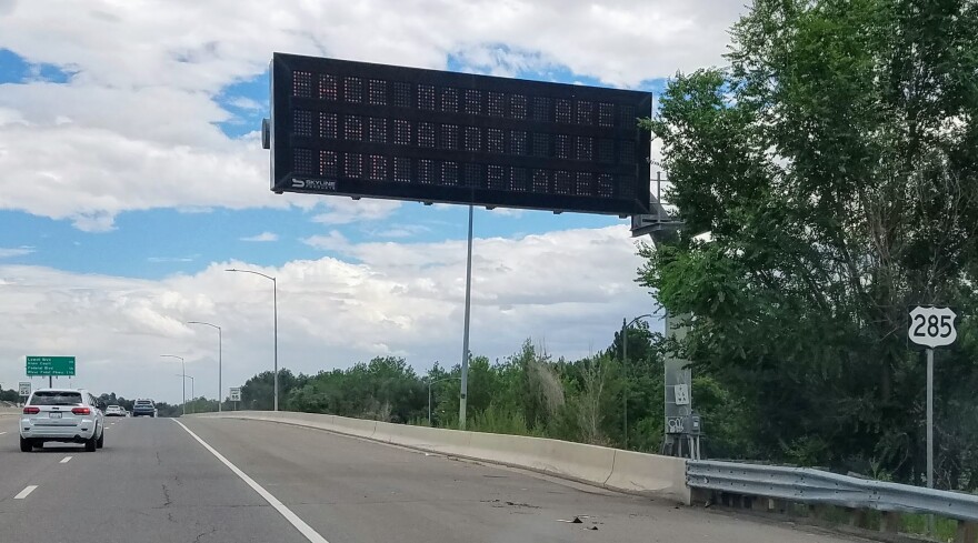 A sign in Denver about mandatory face masks in July 2020.