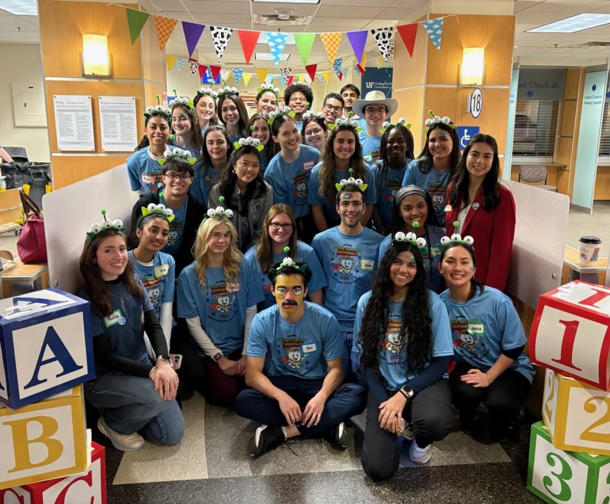 University of Florida College of Dentistry student volunteers get together to celebrate a successful Super Sealant Saturday on Feb. 7, 2026.