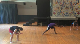 QuTheatr Ensemble members warm up before rehearsal at the Balch Street Theatre in Akron.