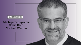 Black-and-white portrait of a man in glasses and a suit, with text about Michigan’s 2026 Supreme Court race and the name Michael Warren on a purple gradient background.