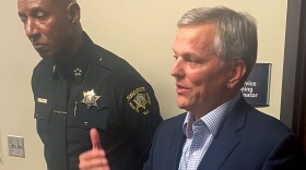 Gov. Josh Stein (right) answers a reporter’s question as Forsyth Sheriff Bobby Kimbrough listens at the Forsyth County Sheriff’s Office headquarters on Wednesday.