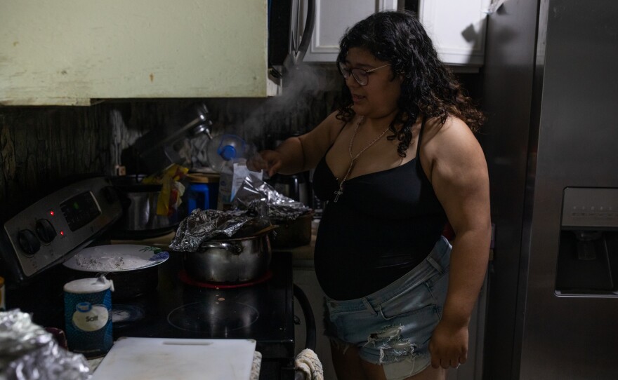 Genesis Espinoza Sierra helps make lunch at her family's home in Wallace on April 17, 2026. Her brother Edilberto Espinoza Sierra was shot and killed by the Wilmington Police Department in the early morning hours of March 8 following an incident in a downtown Wilmington parking garage. Espinoza Sierra was incorrectly identified as a suspect before he was killed and now his family is seeking answer and accountability.