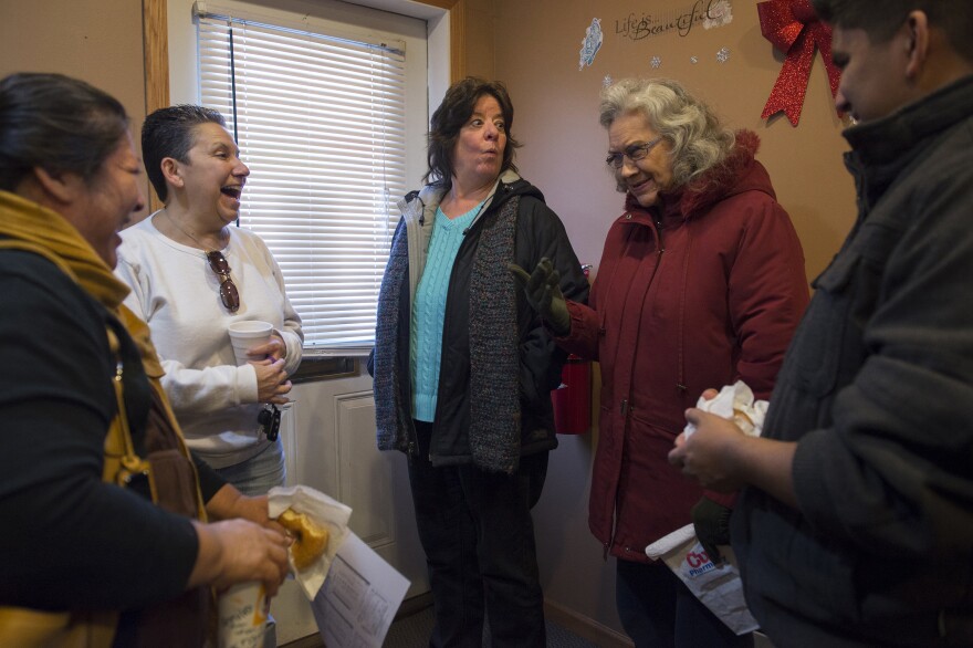 Residents gather in the Park Plaza office. Many say that as the cooperative matures, it's building a sense of community.