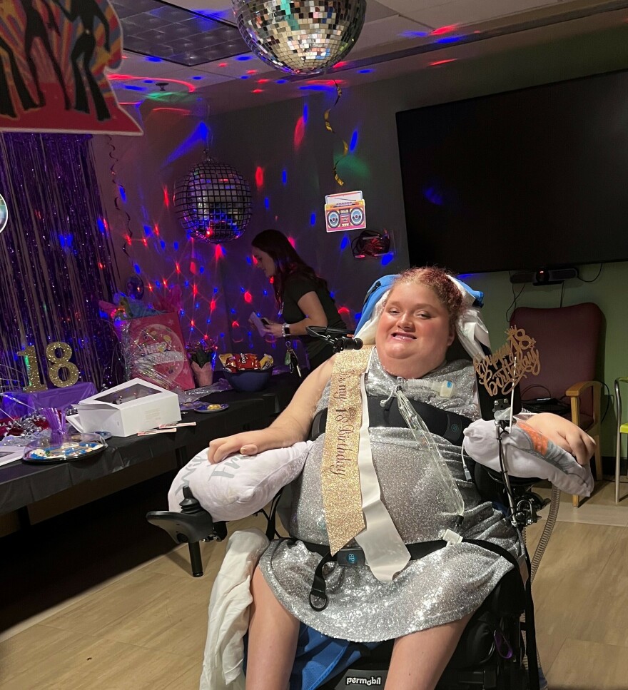 Alexis Ratcliff attends her 18th birthday party at the hospital in Winston-Salem, N.C. She is a quadriplegic who uses a ventilator and has lived at Atrium Health Wake Forest Baptist since she was 13.