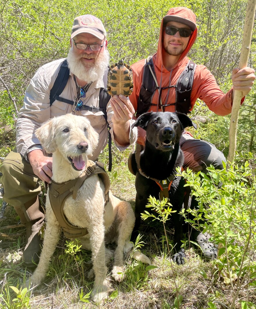 Bill Parsons and his dog Mooz with Jake Lammi from the Diamond Dogs Detection Team with his K9 Ranger.