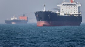 Oil tankers sit at anchor offshore in the Strait of Hormuz off Bandar Abbas, Iran, Saturday, May 2, 2026. (Amirhosein Khorgooi/ISNA via AP)